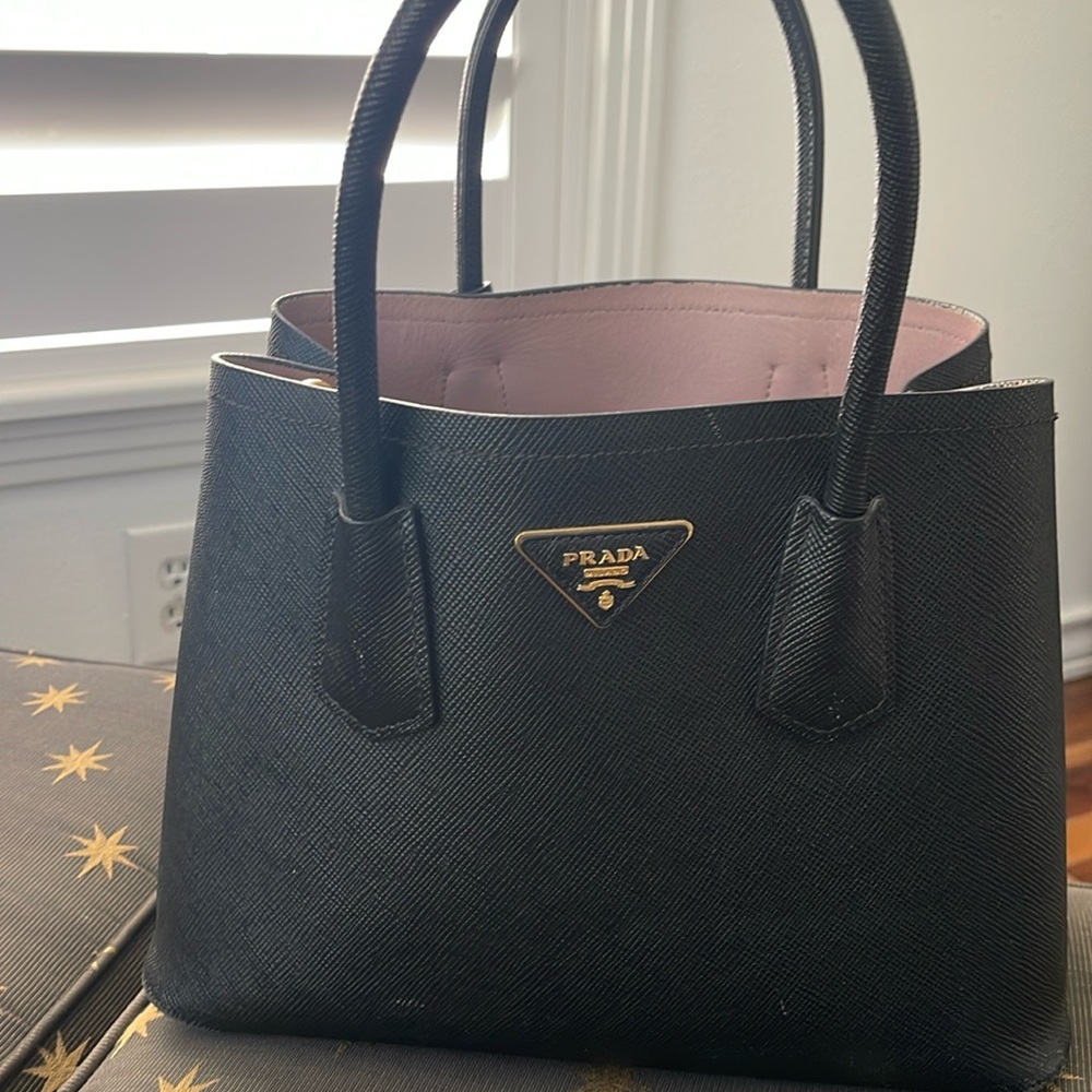 Prada purse- slight wear on the bottom edges - inside is in great condition